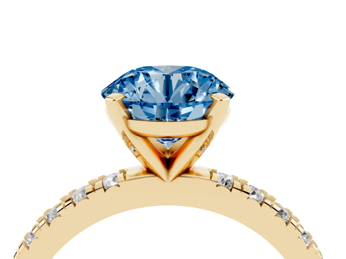 Fancy Blue Round Cut Diamond Pavé Band Solitaire with Four-Prong Setting Yellow gold