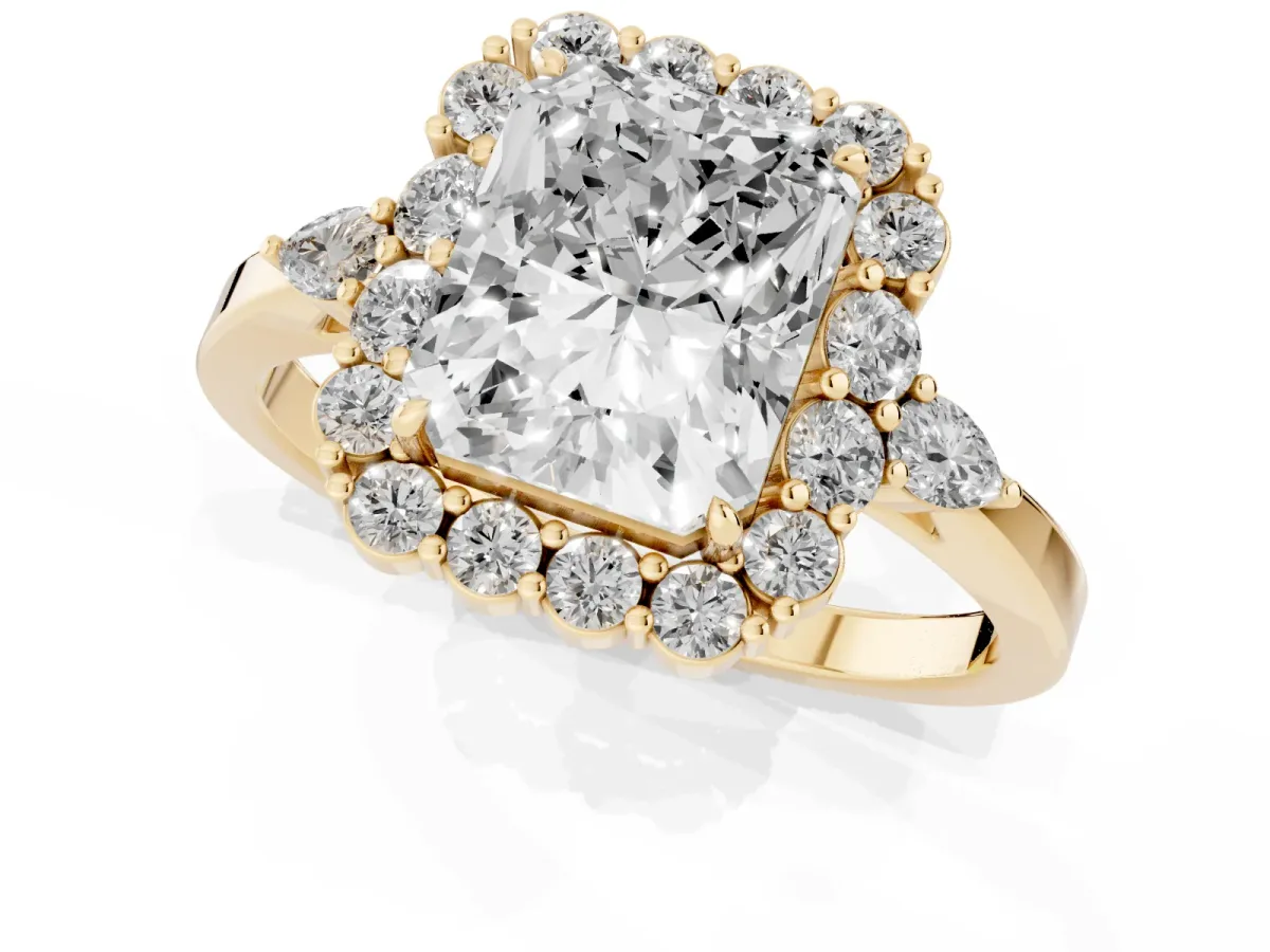 Radiant Cut Diamond Halo Ring with Pear Side Stones and Prong Setting Yellow gold