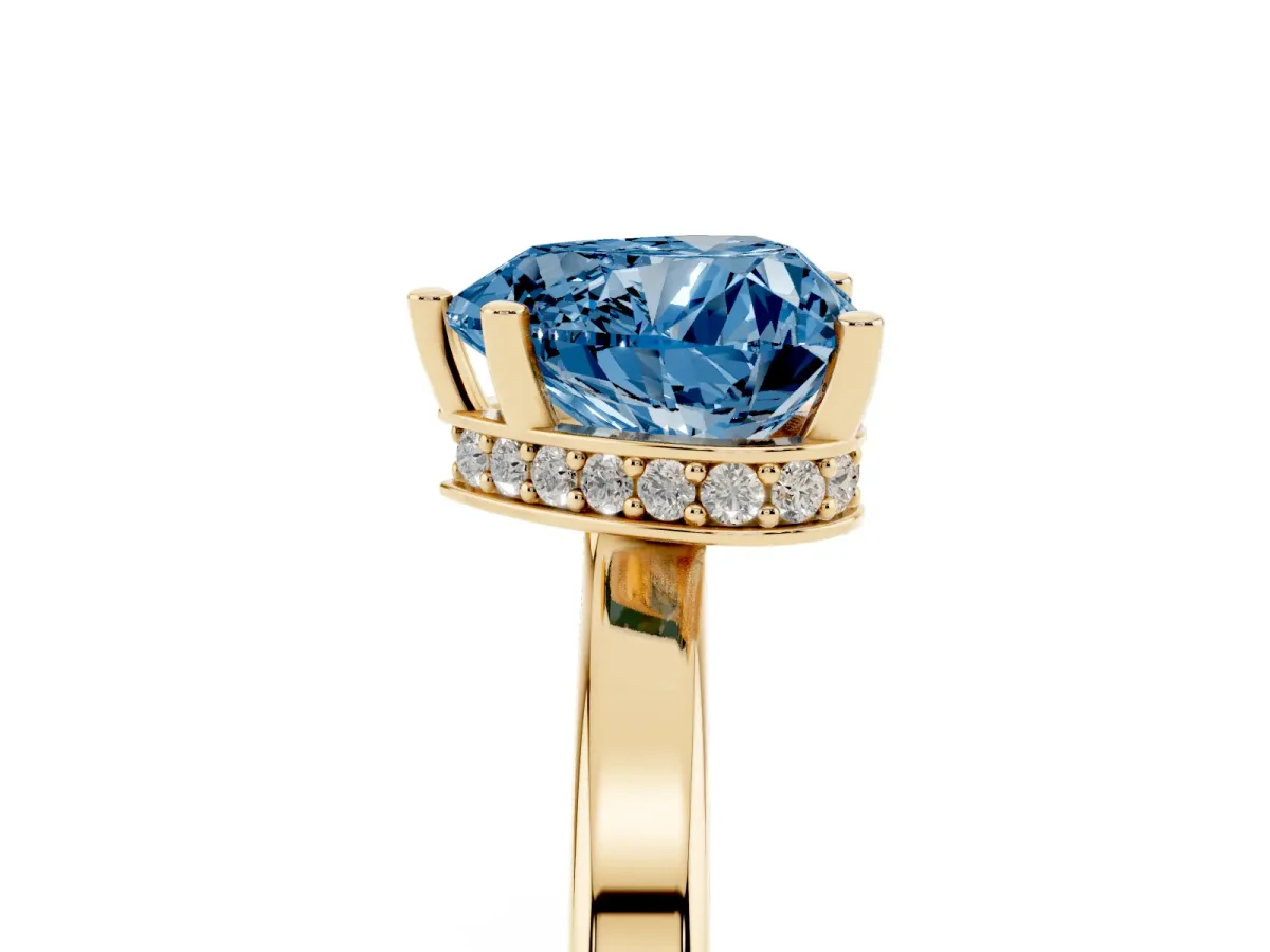 Fancy Blue Heart Cut Cut Solitaire Engagement Ring with Four-Prong Setting on a Classic Band Yellow gold