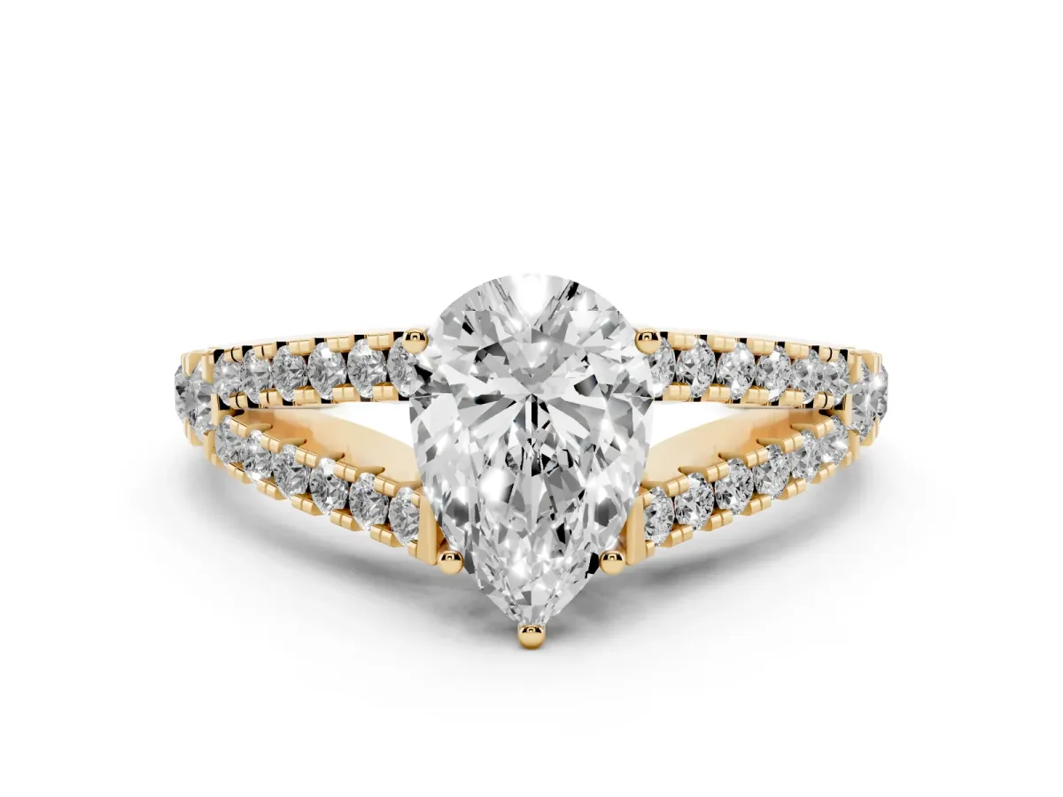 Pear Cut Diamond Split Shank Pavé Engagement Ring with Four-Prong Setting Yellow gold