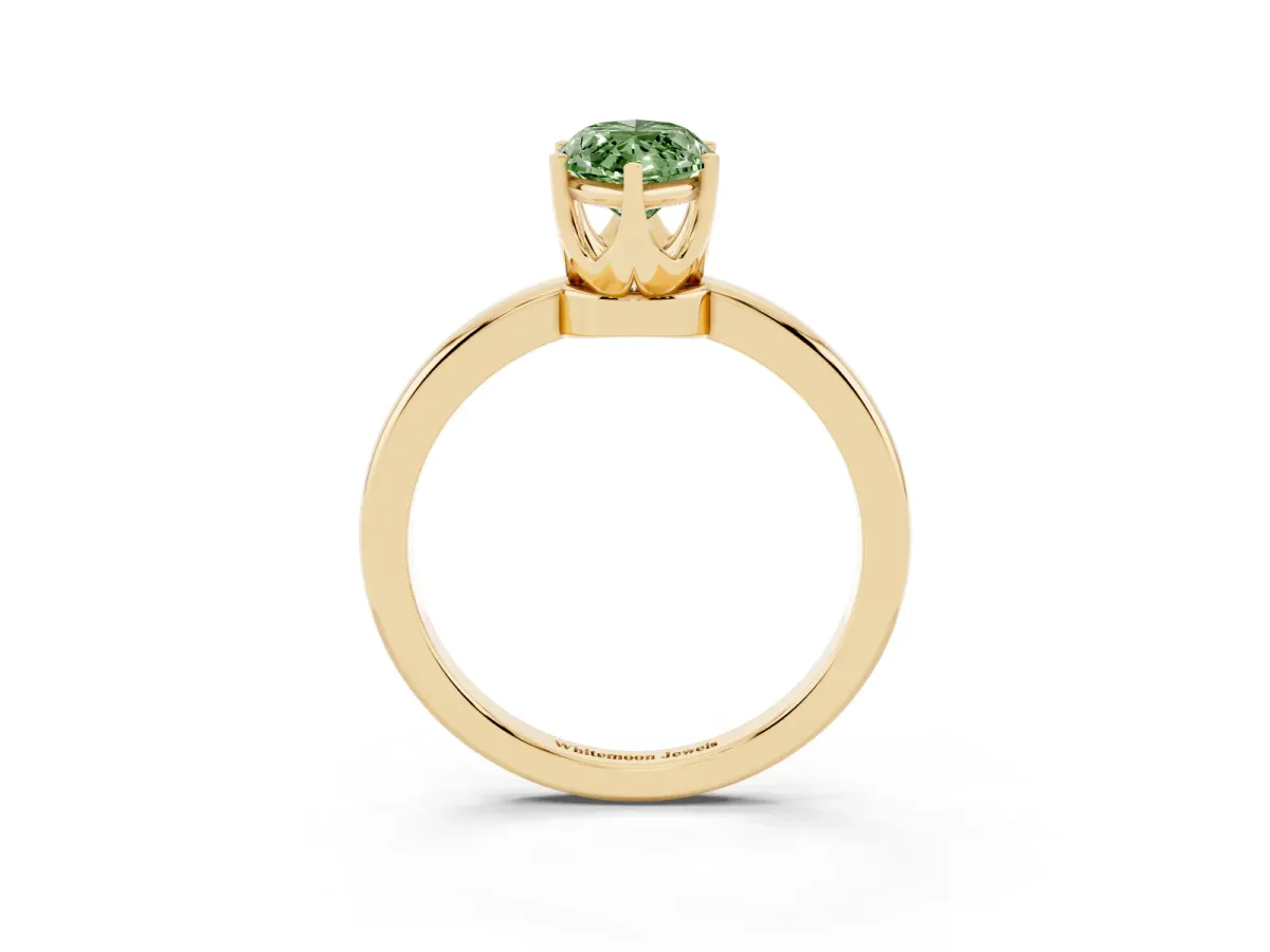 Fancy Green Marquise Cut Solitaire Diamond Ring with Six-Prong Setting on a Classic Band Yellow gold