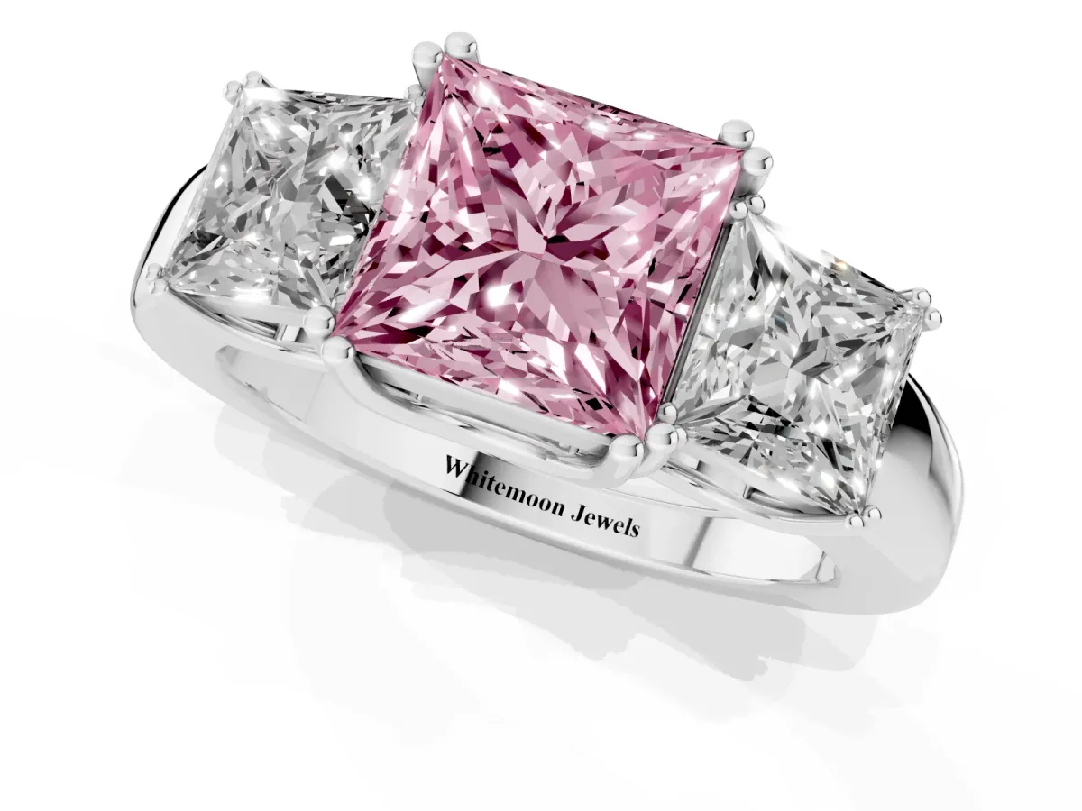 Fancy Pink Three-Stone Princess Cut Cut Diamond Ring with Channel Set Band and Four-Prong Setting Silver