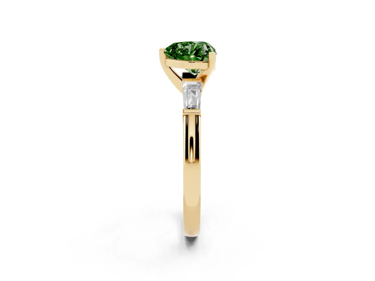 Fancy Green Heart Cut Solitaire with Tapered Baguette Side Stones on a Classic Band with Four-Prong Setting Yellow gold