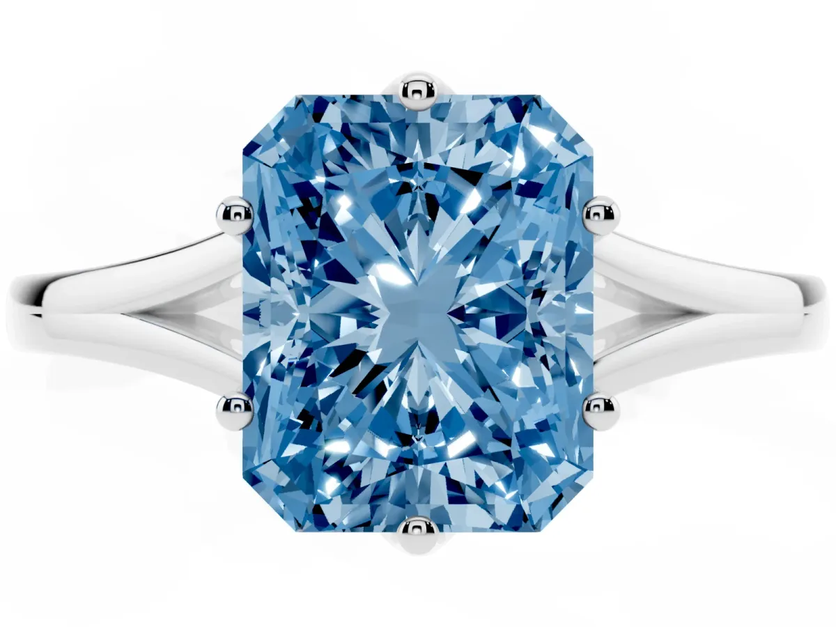 Fancy Blue Radiant Cut Solitaire Diamond Ring with Six-Prong Setting and Tapered Band Silver