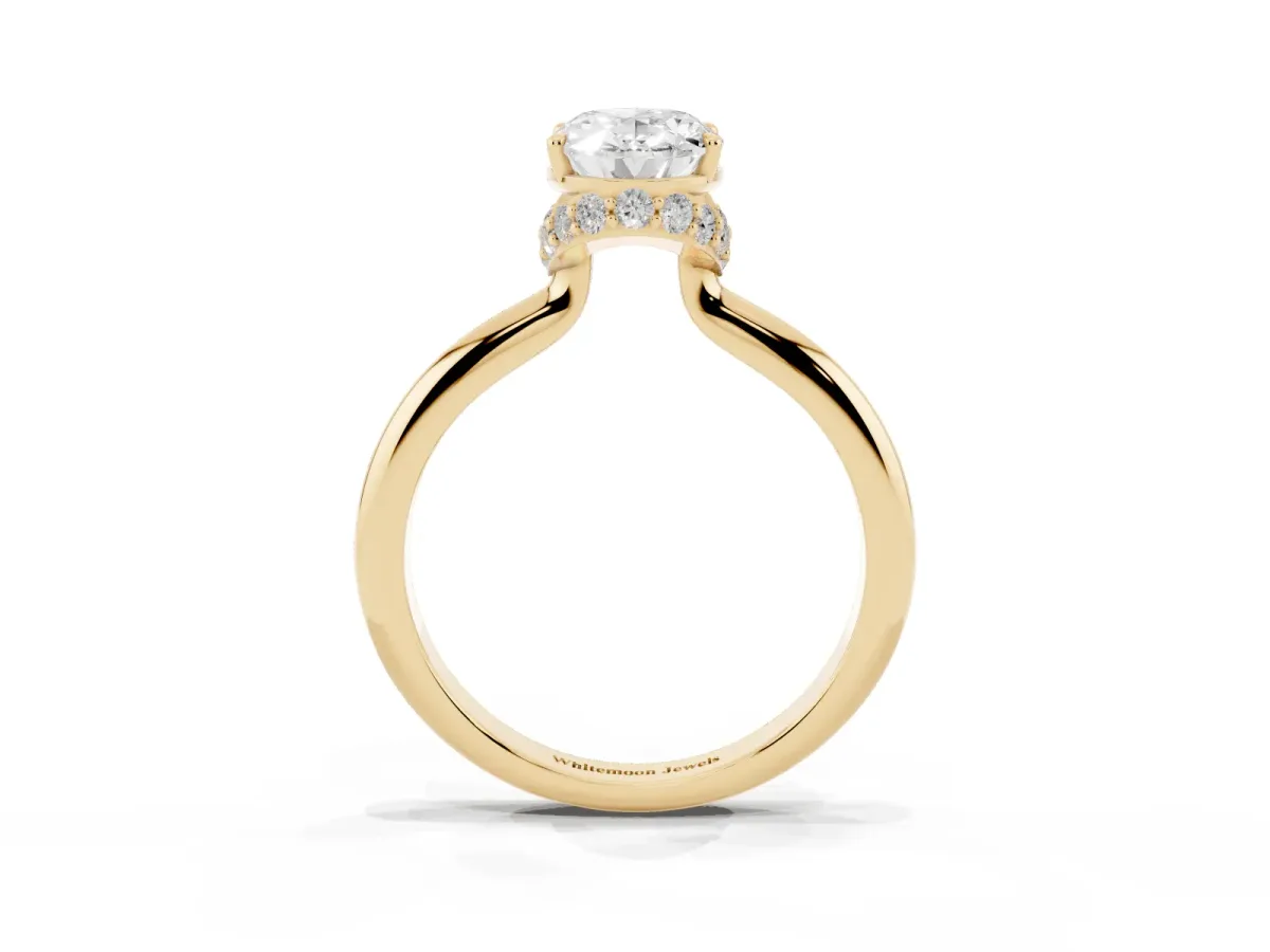 Oval Cut Brilliant Solitaire Engagement Ring with Six-Prong Setting and Classic Band Yellow gold