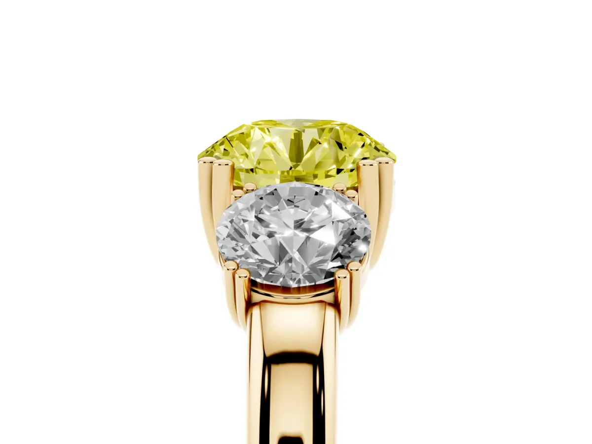 Fancy Yellow Three-Stone Round Cut Cut Diamond Ring with Channel Set Band and Four-Prong Setting Yellow gold