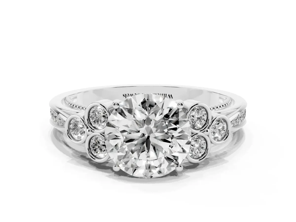 Round Cut Cut Diamond Engagement Ring with Bezel Set Round Side Stones and Prong Setting White gold