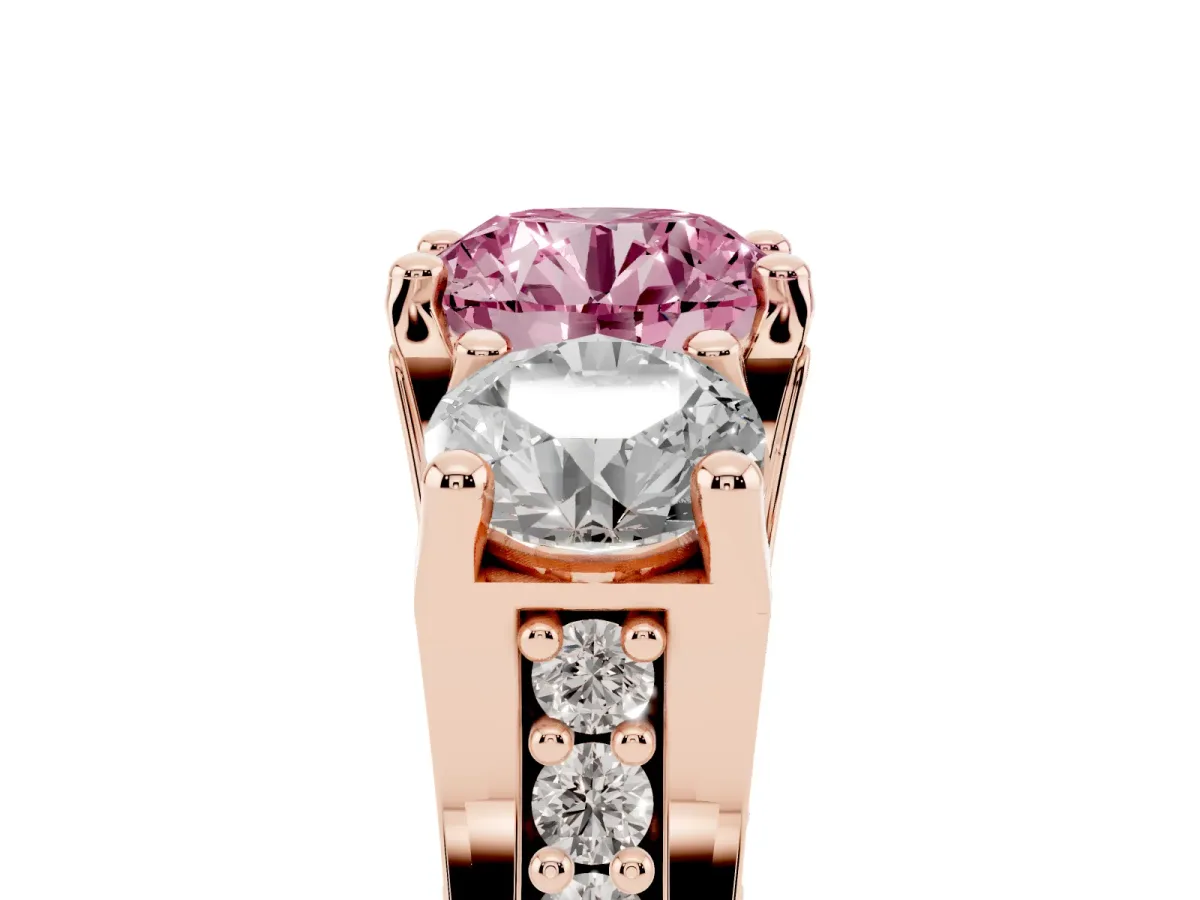 Fancy Pink Round Cut Diamond Three-Stone Ring with Channel Set Band and Four-Prong Setting Rose gold