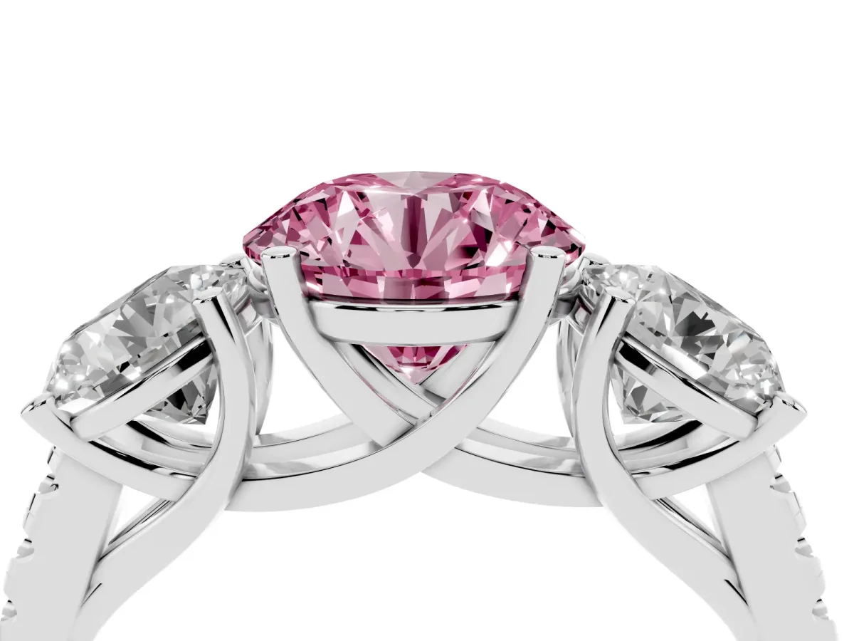 Fancy Pink Three-Stone Round Cut Diamond Ring with Round Pavé Band and Prong Setting Silver