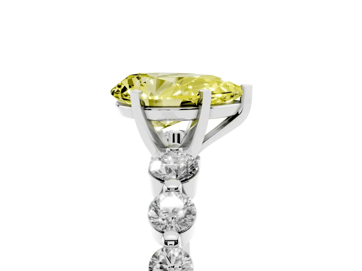 Fancy Yellow Pear Cut Solitaire Diamond Ring with Pave Band and Four-Prong Setting Silver