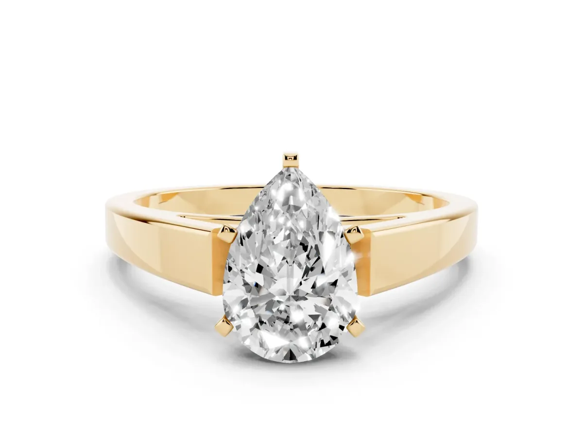 Pear Cut Solitaire Engagement Ring with Four-Prong Setting and Tapered Band Yellow gold