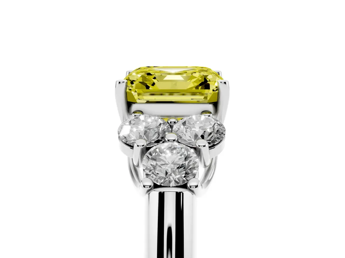 Fancy Yellow Asscher Cut Cut Diamond Cluster Ring with Round Accent Stones and Prong Setting on a Classic Band White gold