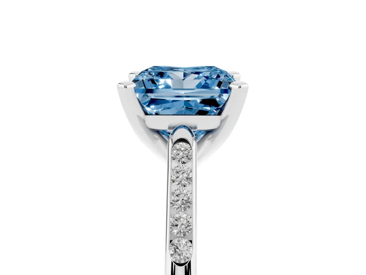 Fancy Blue Princess Cut Diamond Solitaire Ring with Channel Set Round Band and Prong Setting Silver