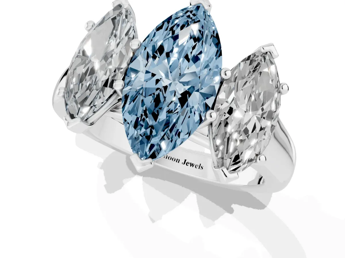 Fancy Blue Marquise Cut Three-Stone Diamond Ring with Prong Setting on a Classic Band Silver