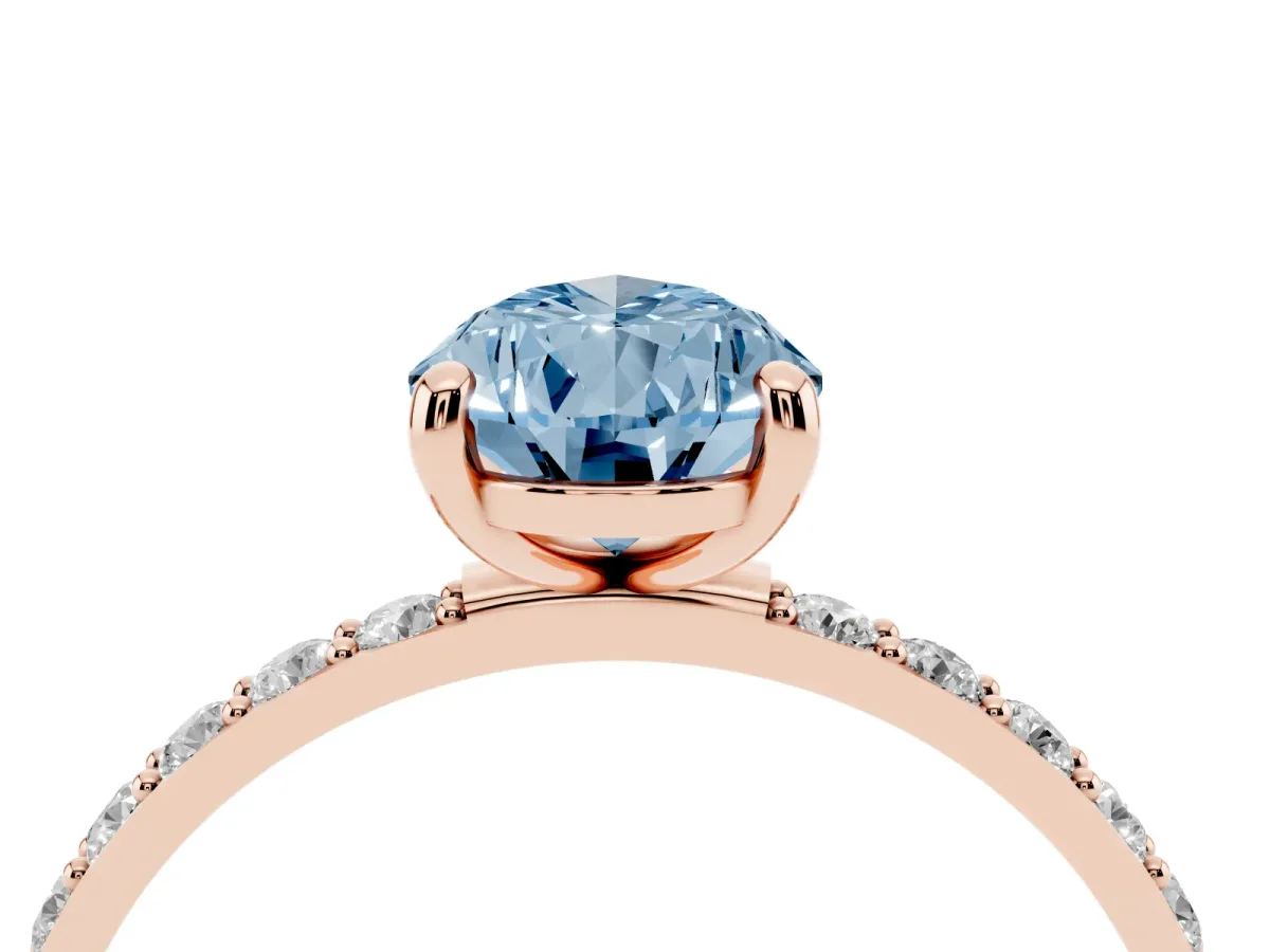 Fancy Blue Pear Cut Diamond Solitaire Ring with Round Pavé Band and Prong Setting Rose gold
