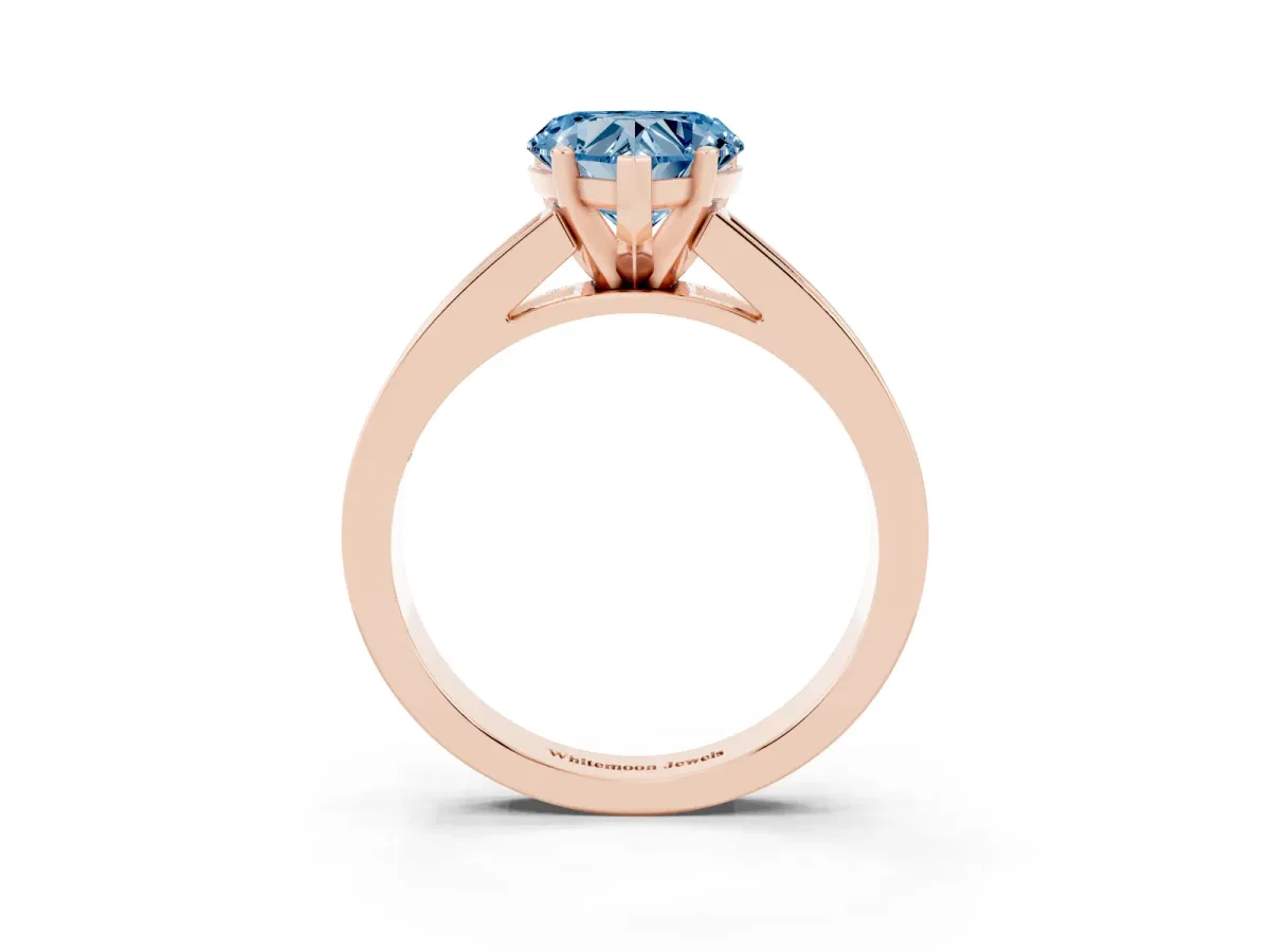 Fancy Blue Heart Cut Solitaire Diamond Ring with Channel-Set Band and Four-Prong Setting Rose gold