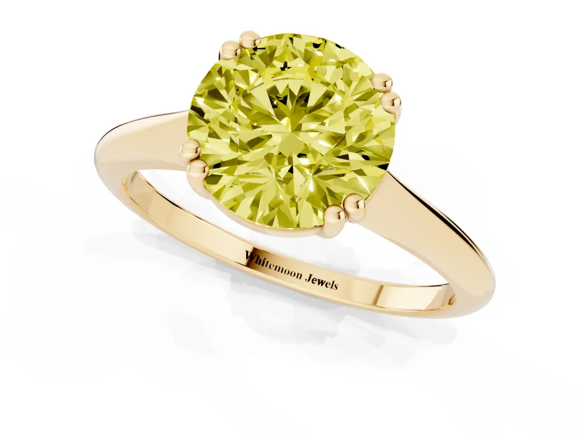 Fancy Yellow Round Cut Solitaire Diamond Ring with Six-Prong Setting and Classic Band Yellow gold