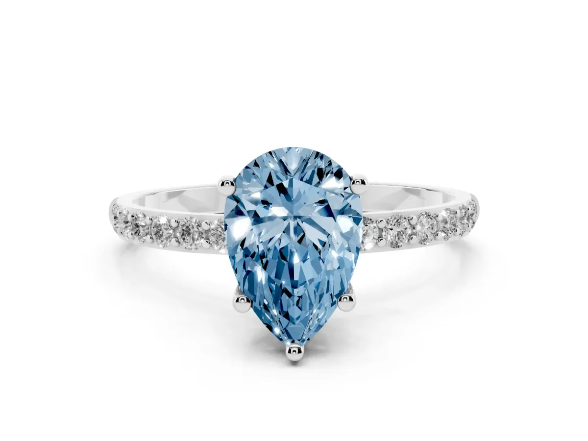 Fancy Blue Pear Cut Diamond Solitaire Ring with Round Pavé Shoulders and Prong Setting Silver