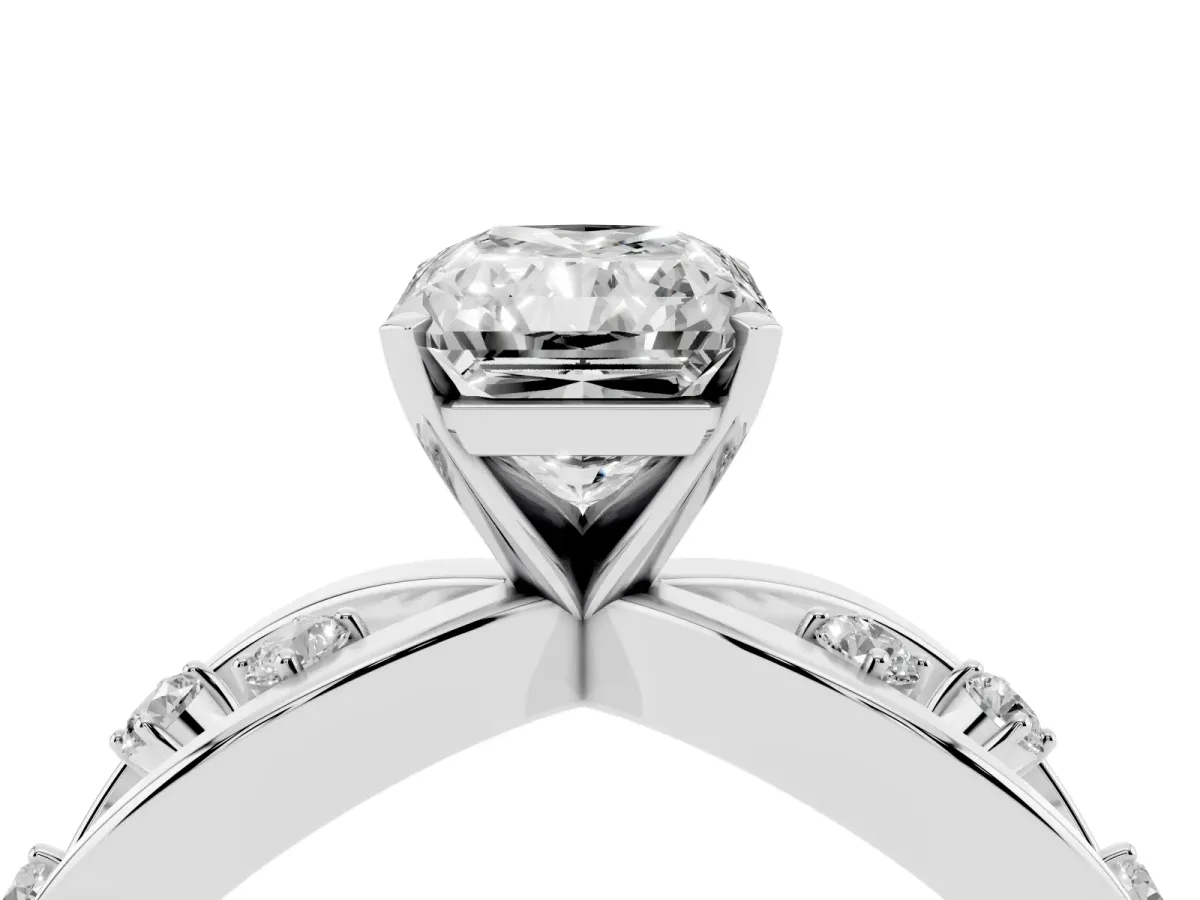 Radiant Cut Cut Solitaire Diamond with Side Stones on Criss-Cross Band and Four-Prong Setting Platinum