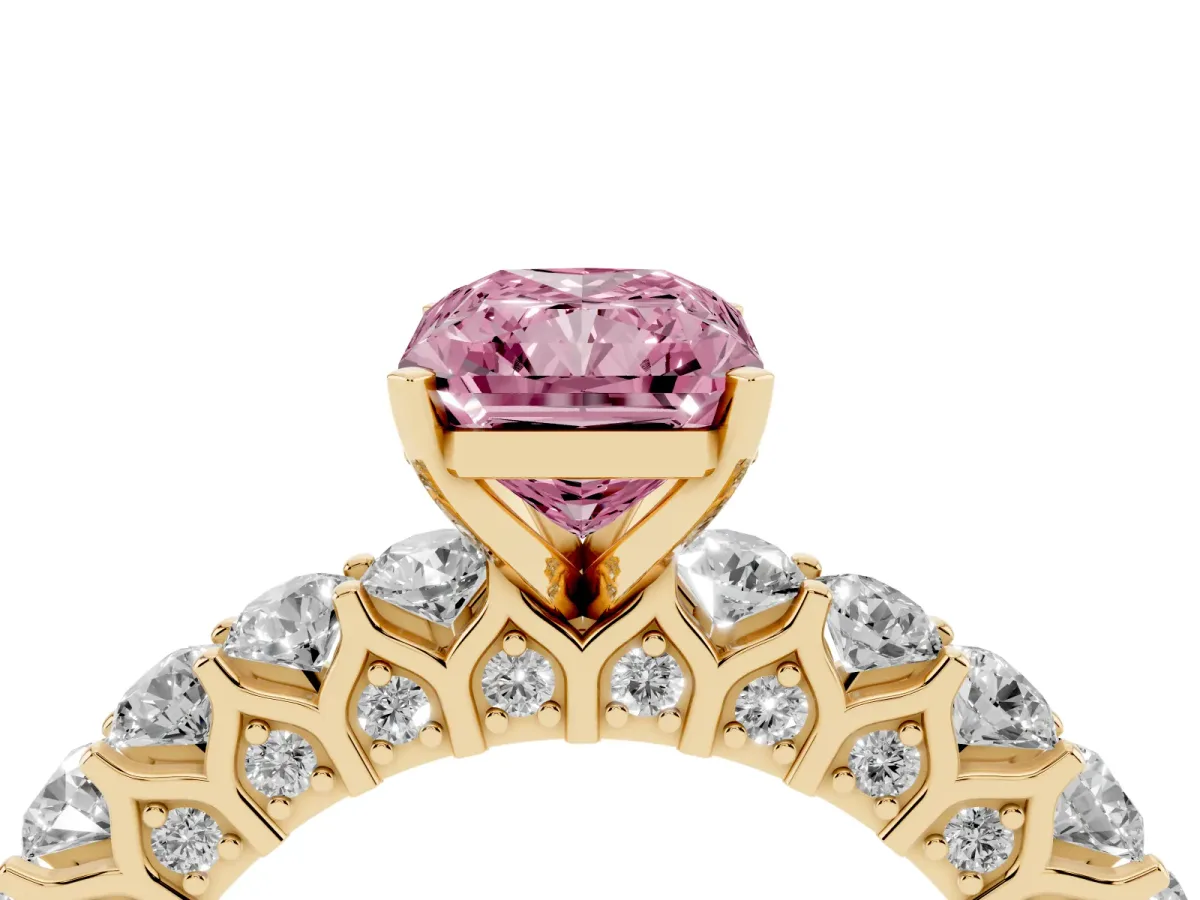 Fancy Pink Radiant Cut Diamond Solitaire Ring with Shared Prong Pavé Band and Four-Prong Setting Yellow gold
