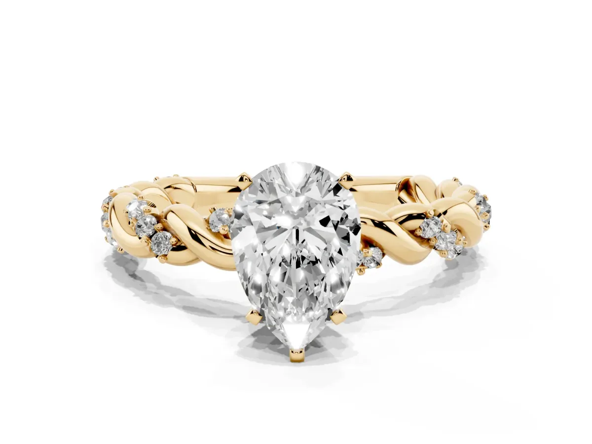 Pear Cut Diamond Solitaire Ring with Twisted Band and Pavé Accents Yellow gold