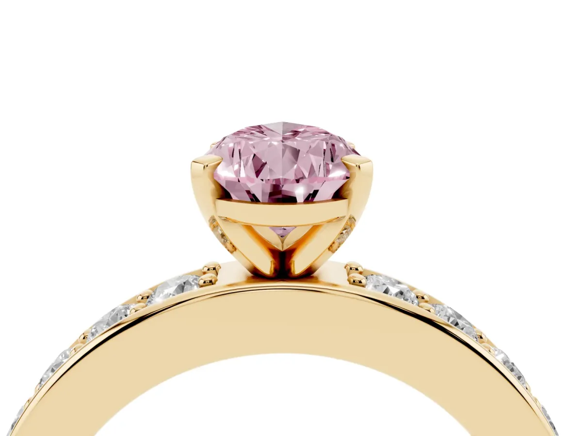 Fancy Pink Pear Cut Diamond Engagement Ring with Channel Set Round Band and Prong Setting Yellow gold