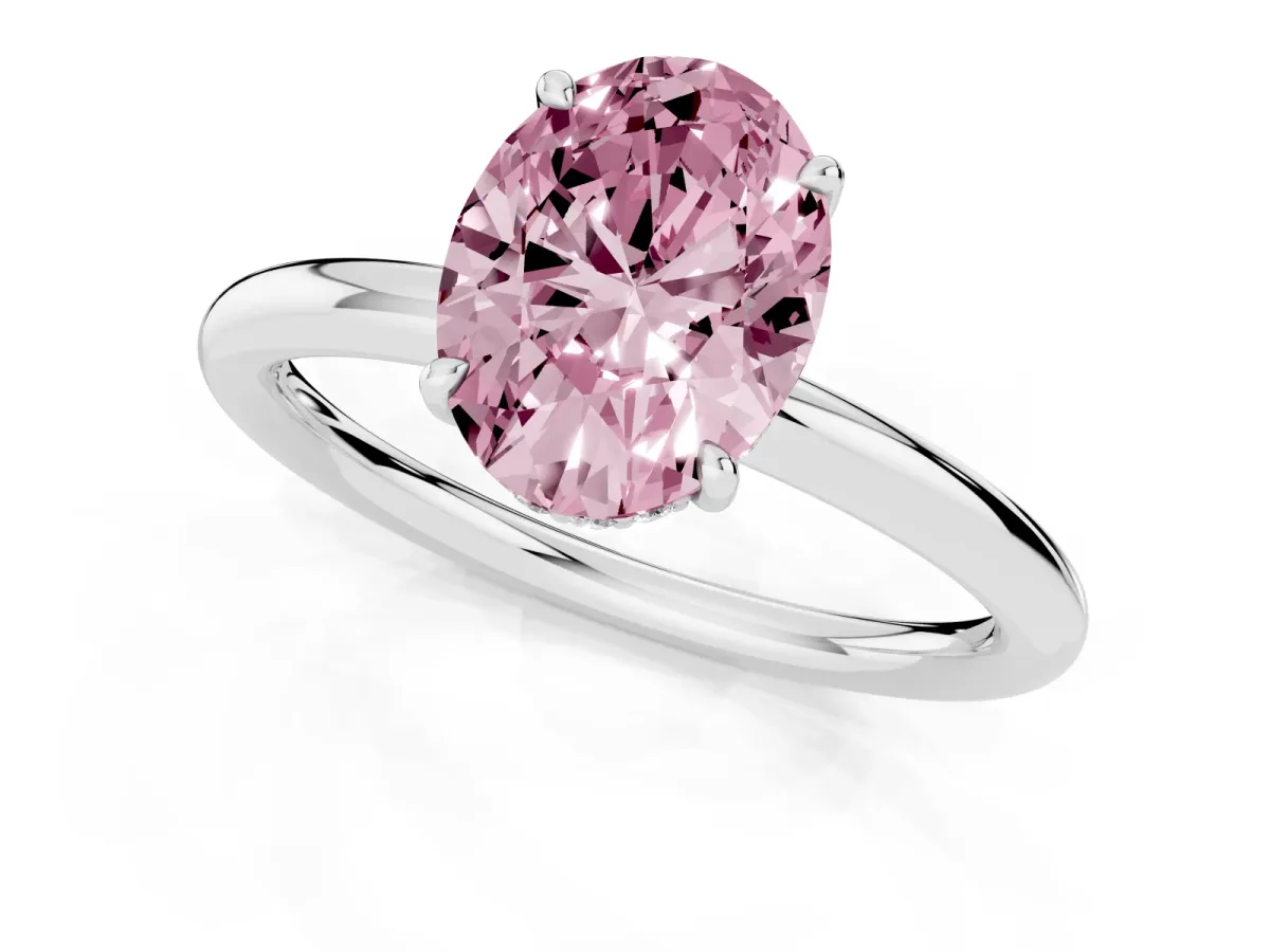 Fancy Pink Oval Cut Diamond Solitaire Ring with Thin Band and Four-Prong Setting Silver