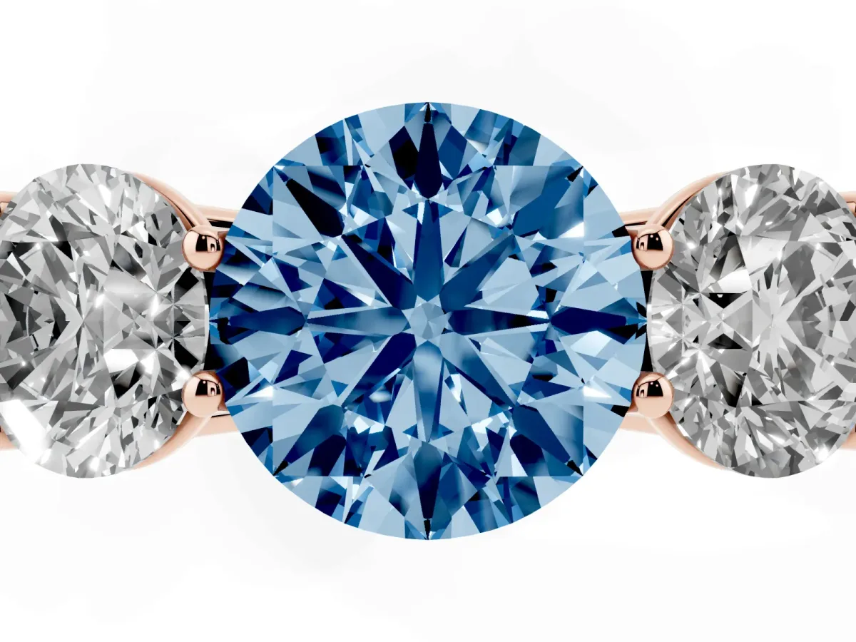 Fancy Blue Round Cut Three-Stone Diamond Ring with Prong Setting on a Classic Band Rose gold