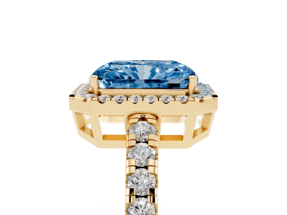 Fancy Blue Radiant Cut Diamond Halo Ring with Pavé Band and Four-Prong Setting Yellow gold