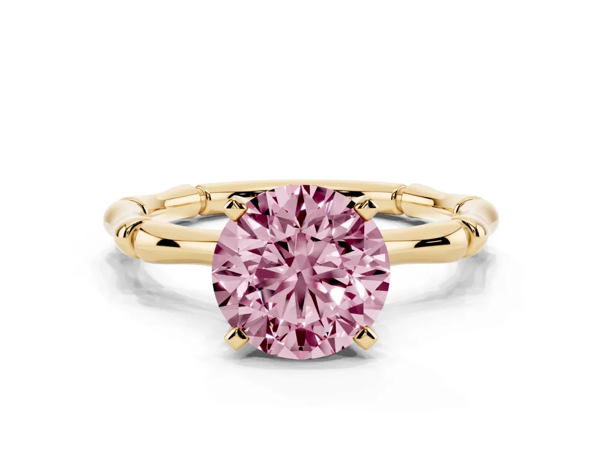 Fancy Pink Round Cut Solitaire Diamond Ring with Bamboo Band and Four-Prong Setting Yellow gold