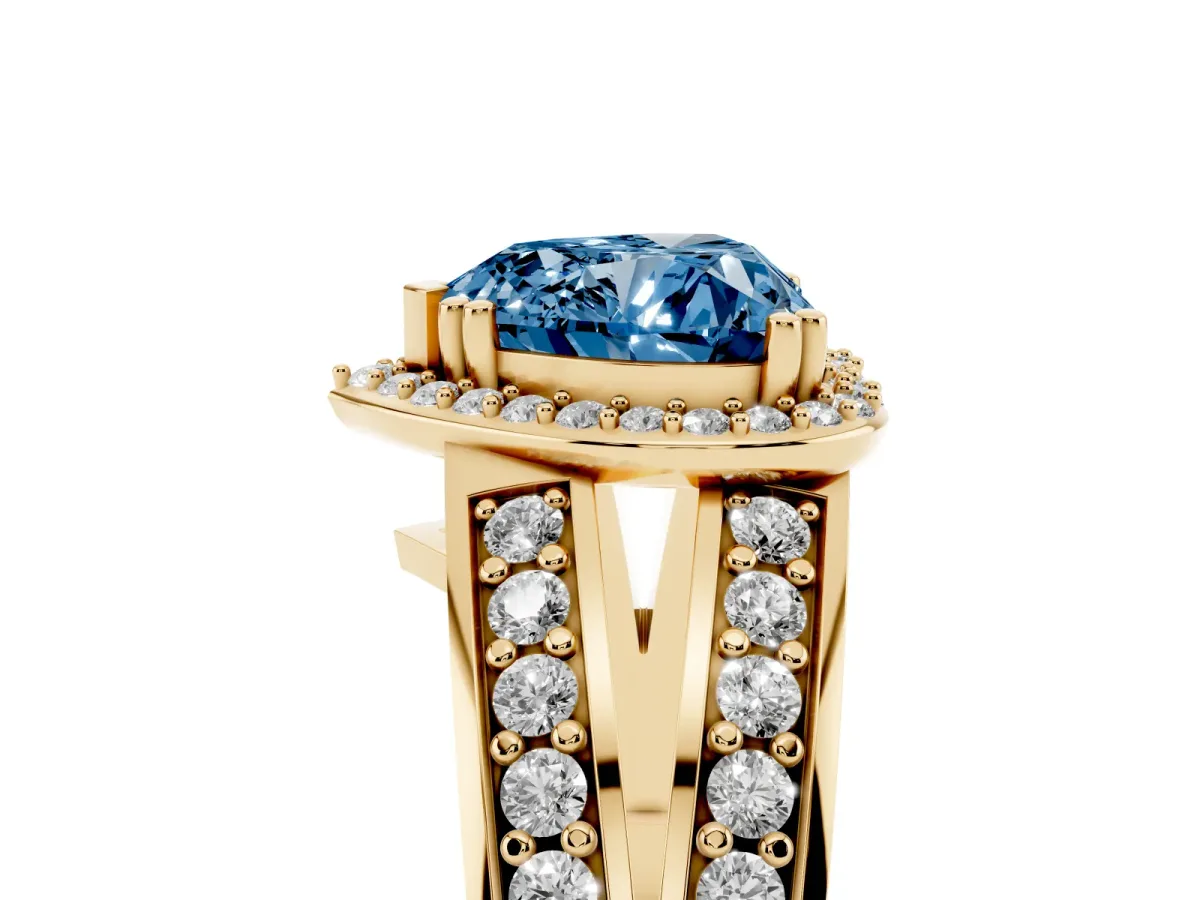 Fancy Blue Heart Cut Diamond Halo Ring with Split Shank Pavé Band and Four-Prong Setting Yellow gold