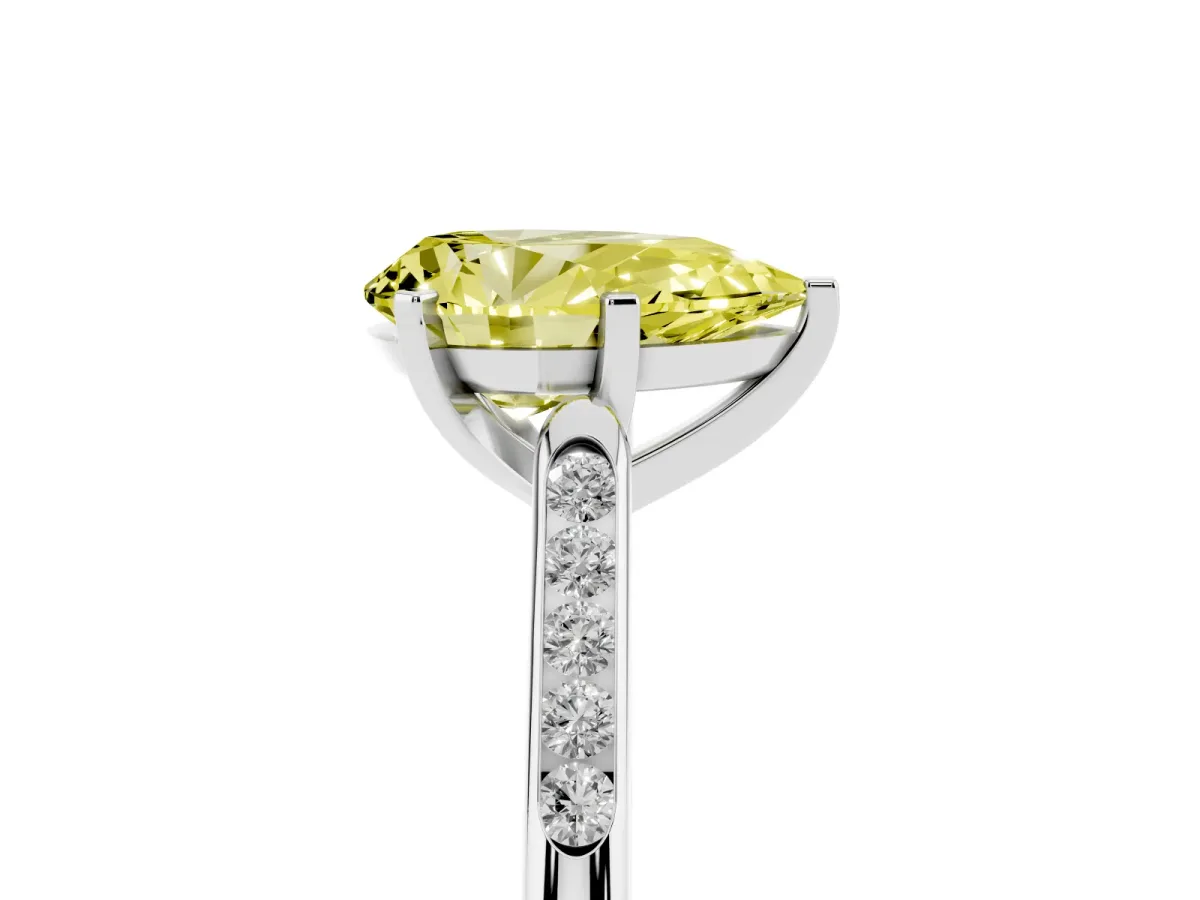 Fancy Yellow Pear Cut Diamond Solitaire Ring with Channel Set Round Band and Prong Setting Silver