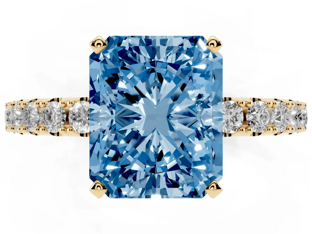 Fancy Blue Radiant Cut Diamond Solitaire Pavé Band with Four-Prong Setting Yellow gold