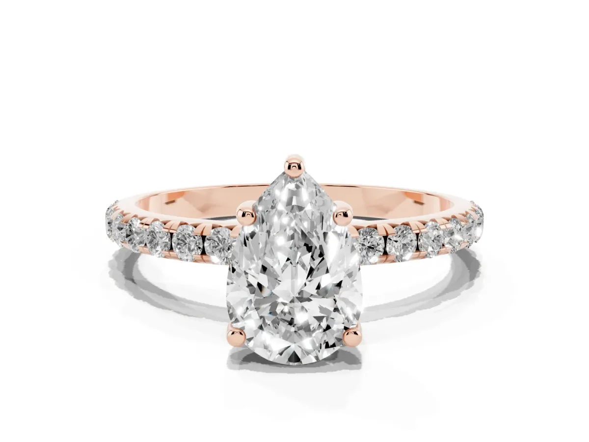 Pear Cut Cut Diamond Solitaire Ring with Micro Pave Band and Four Prong Setting Rose gold