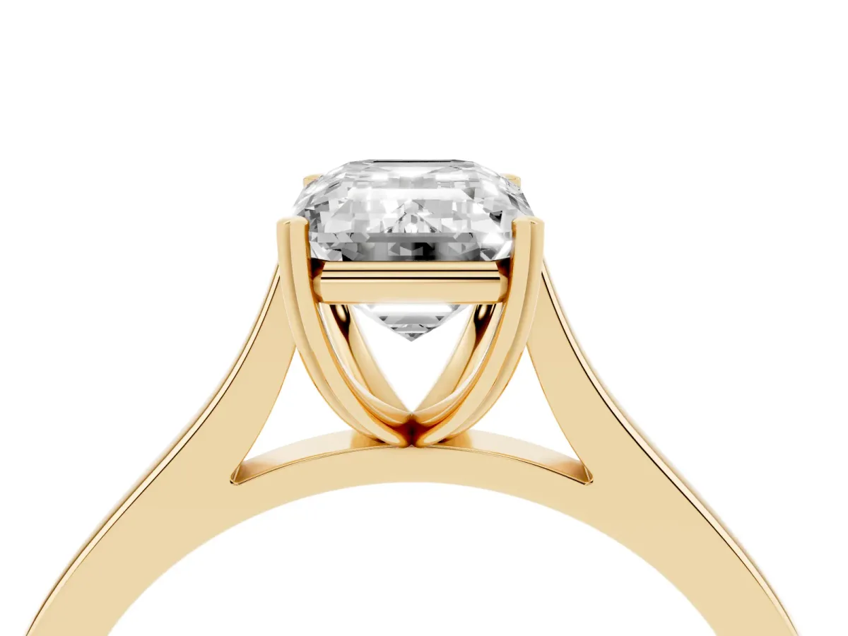 Emerald Cut Solitaire Heart Prong Engagement Ring with Tapered Band Yellow gold
