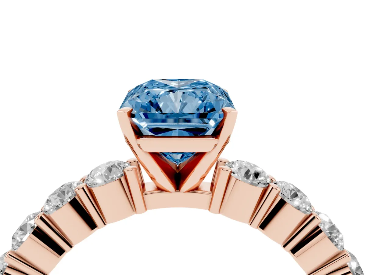 Fancy Blue Radiant Cut Diamond Solitaire Ring with Shared Prong Round Side Stones Rose gold
