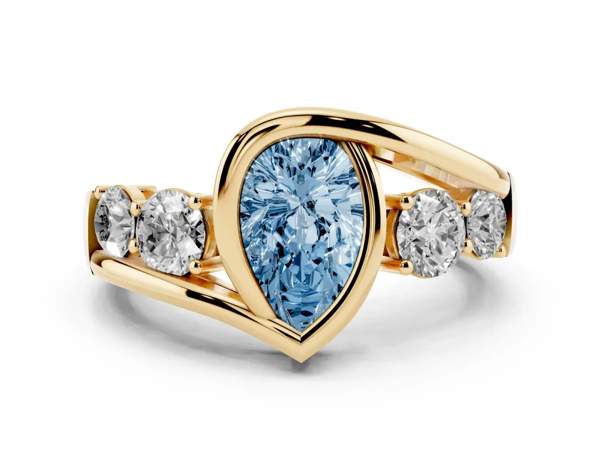 Fancy Blue Bezel Set Pear Cut Diamond Bypass Ring with Round Accents Yellow gold