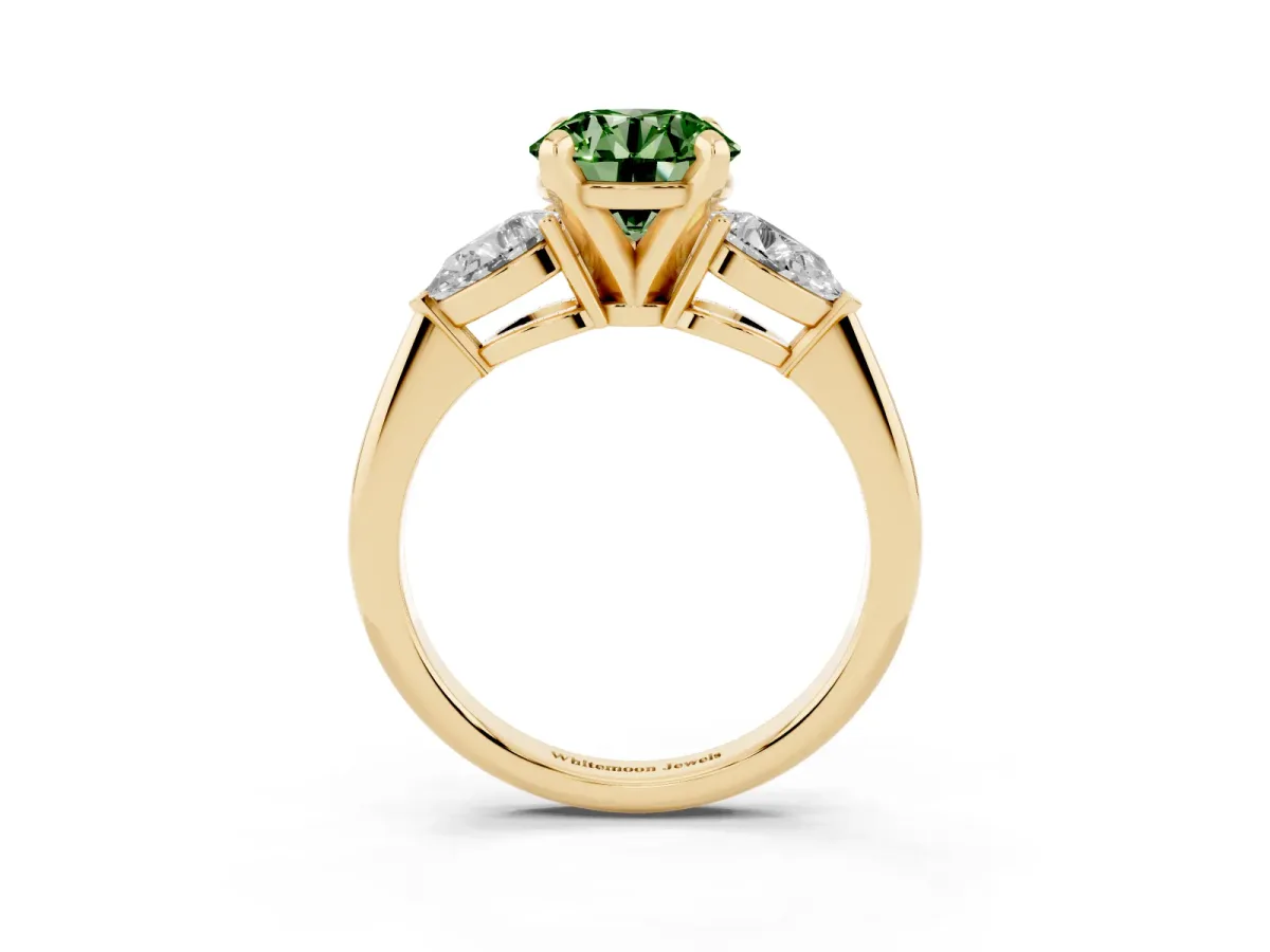 Fancy Green Three-Stone Round Cut Diamond Ring with Pear Side Stones and Four-Prong Setting Yellow gold
