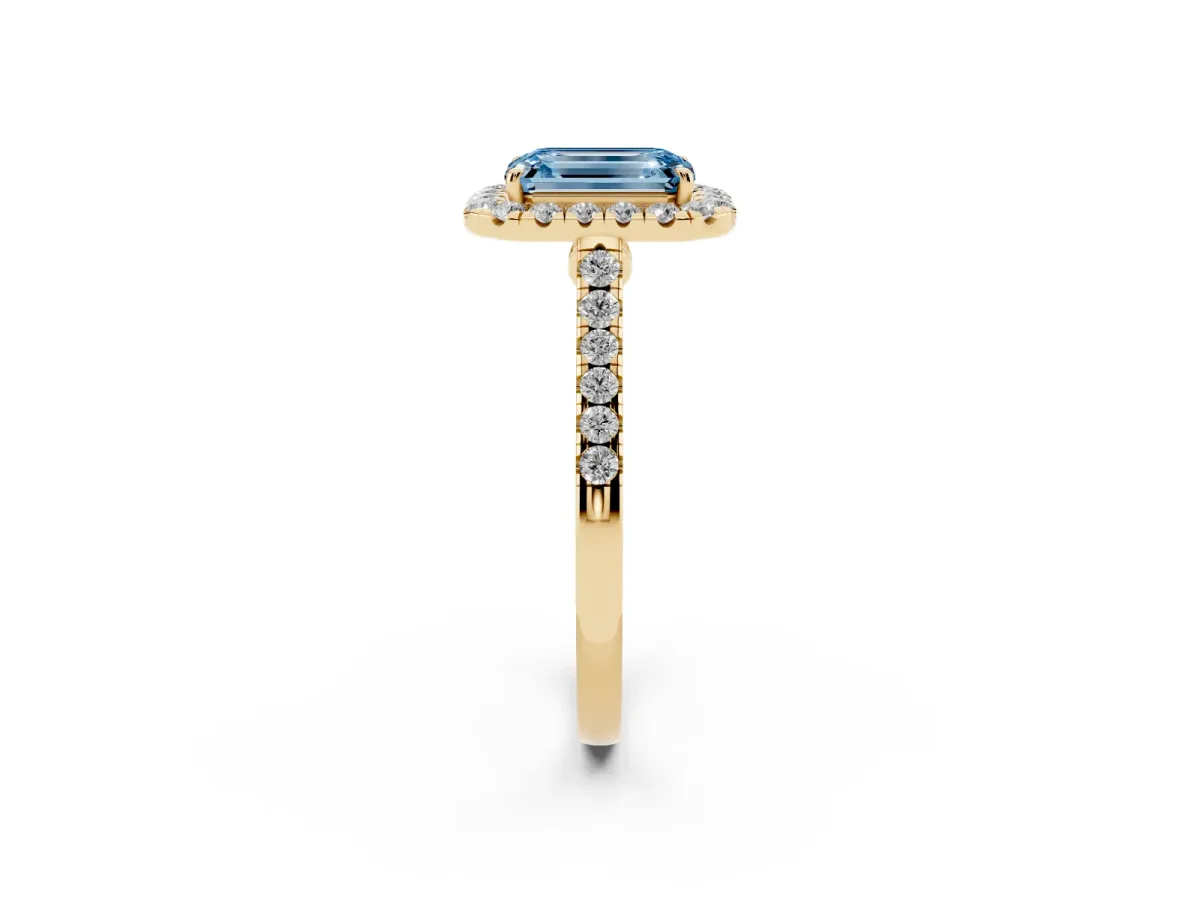 Fancy Blue Emerald Cut Halo Pave Diamond Engagement Ring with Four-Prong Setting Yellow gold