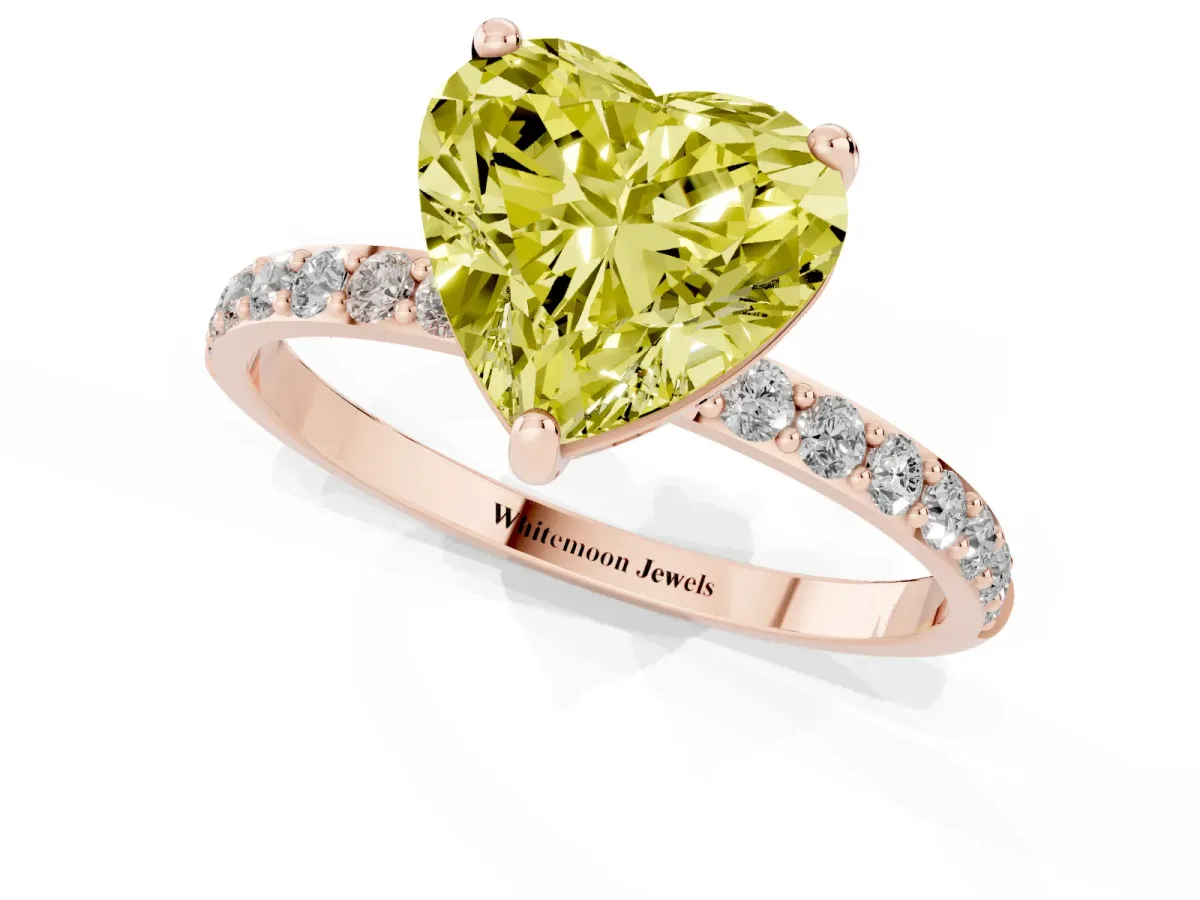 Fancy Yellow Heart Cut Diamond Solitaire Ring with Round Pavé Band and Prong Setting Rose gold