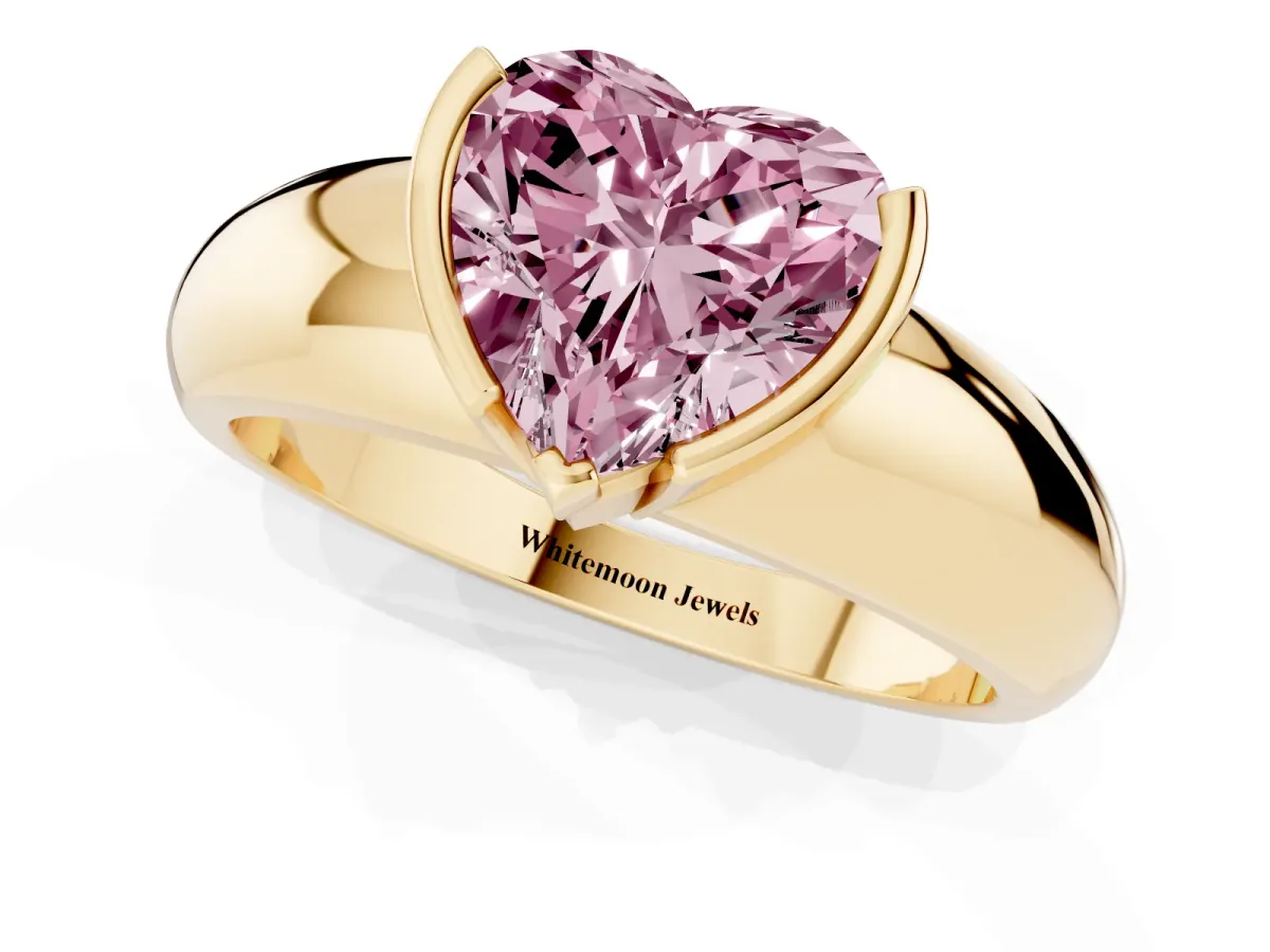 Fancy Pink Heart Cut Solitaire Tension Set Diamond Ring with Wide Band Yellow gold