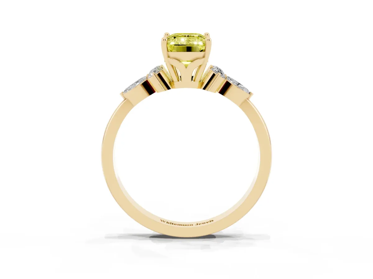 Fancy Yellow Emerald Cut Brilliant Diamond Solitaire Ring with Pear Side Stones and Four-Prong Setting Yellow gold