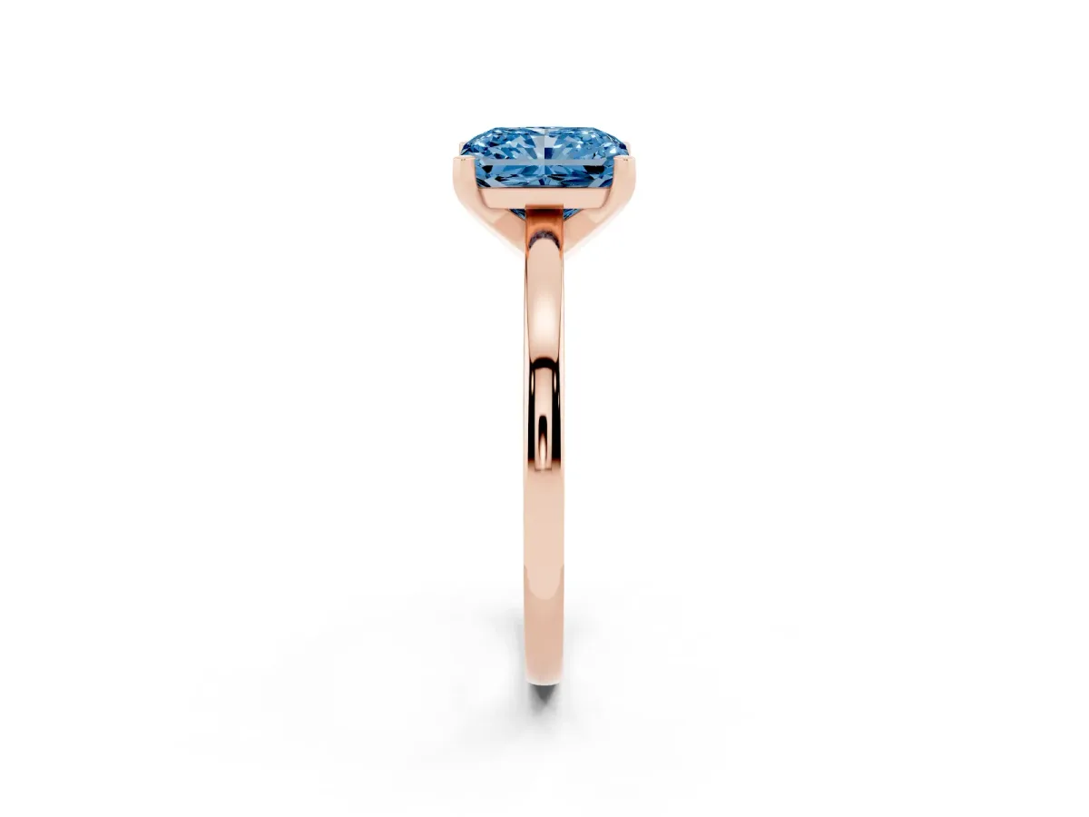 Fancy Blue Radiant Cut Solitaire Diamond Engagement Ring with Four-Prong Setting on a Classic Band Rose gold
