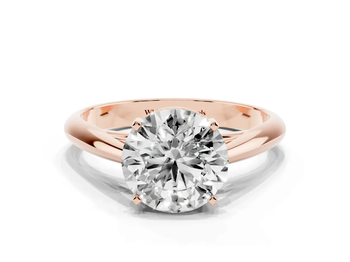 Round Cut Diamond Solitaire Engagement Ring with Cathedral Setting and Four-Prong Mount Rose gold