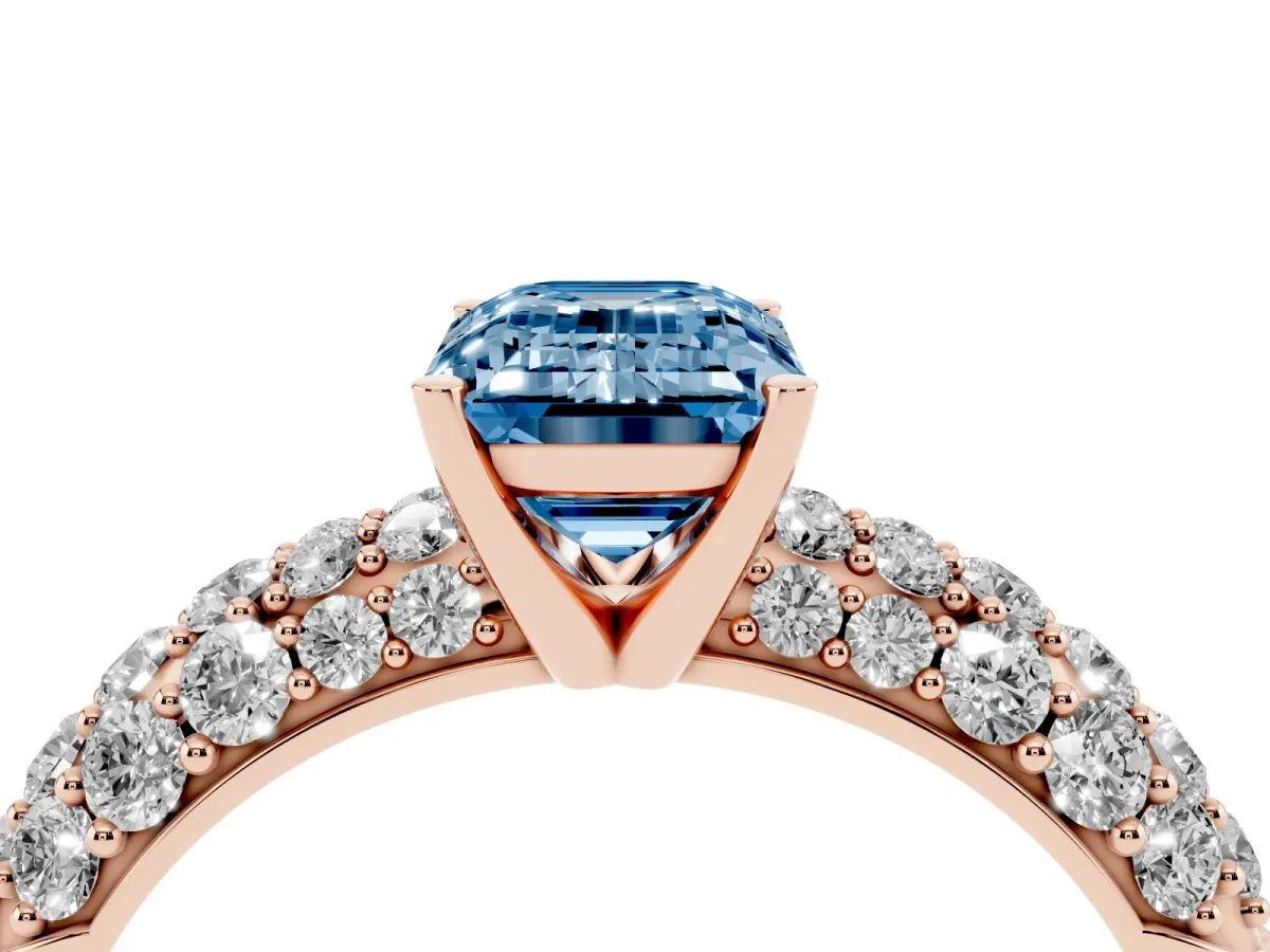 Fancy Blue Emerald Cut Diamond Pavé Band Solitaire Ring with Four-Prong Setting Rose gold