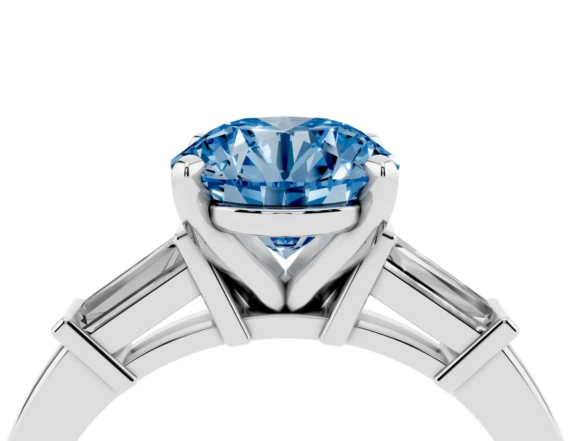 Fancy Blue Round Cut Cut Diamond Solitaire Ring with Tapered Baguette Accents and Four-Prong Setting White gold