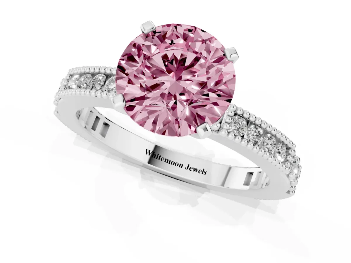 Fancy Pink Round Cut Solitaire with Pavé Band and Four-Prong Setting Silver