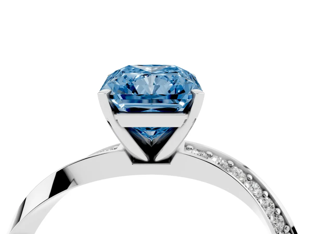 Fancy Blue Radiant Cut Diamond Engagement Ring with Side Stone Accents and Four-Prong Setting Platinum