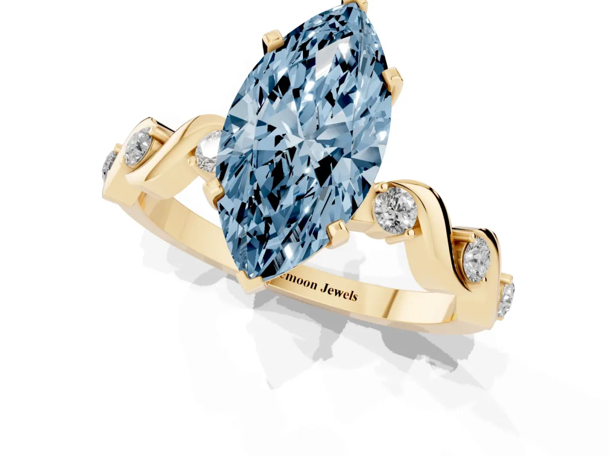 Fancy Blue Marquise Cut Diamond Solitaire Twisted Band with Round Accents and Prong Setting Yellow gold