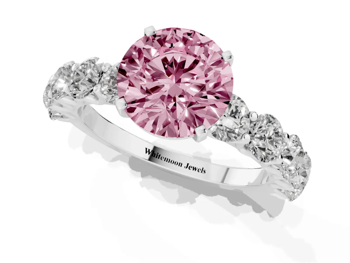Fancy Pink Round Cut Diamond Prong Setting with Side Stones on a Pave Band Silver